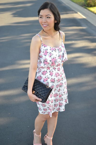 floral mini summer dress with black leather clutch