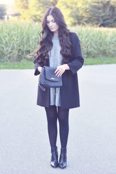Crew neck sweater dress, black wool coat and leather boots