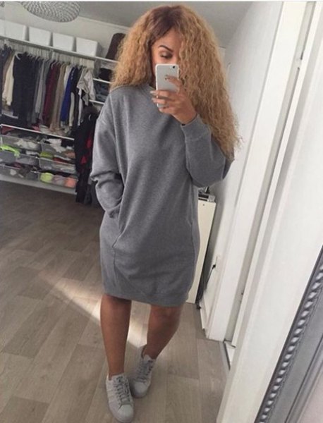 oversized sweater dress with gray sneakers