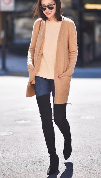 Light yellow knit sweater with overknee boots