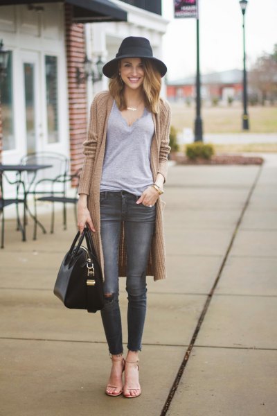 Blush pink sweater with gray skinny jeans
