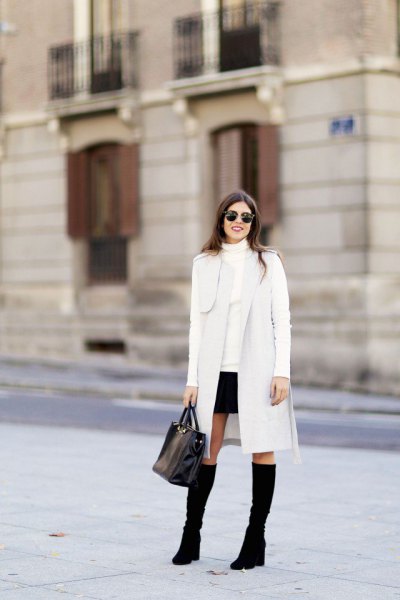 white long cardigan with imitation sweater and mini skirt