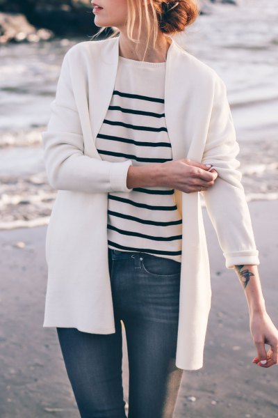 Cardigan with a white and black striped knit sweater
