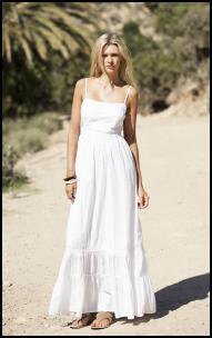 white floor-length airy dress with spaghetti straps