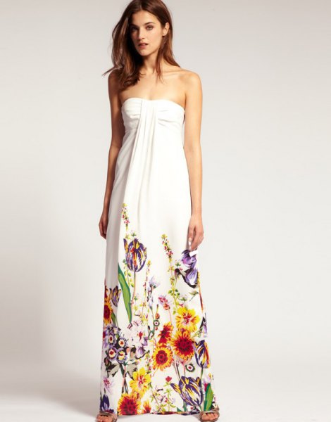 white strapless maxi dress with colorful details and floral print