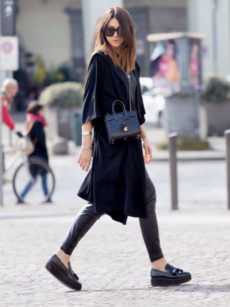 black trench coat with half sleeves, leather leggings and slippers