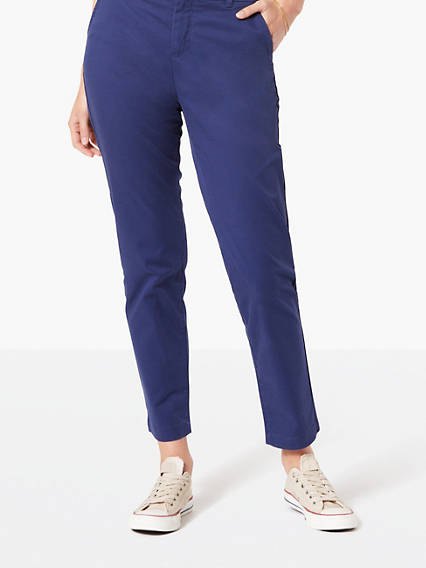 Dark blue, cropped chinos with a white blouse