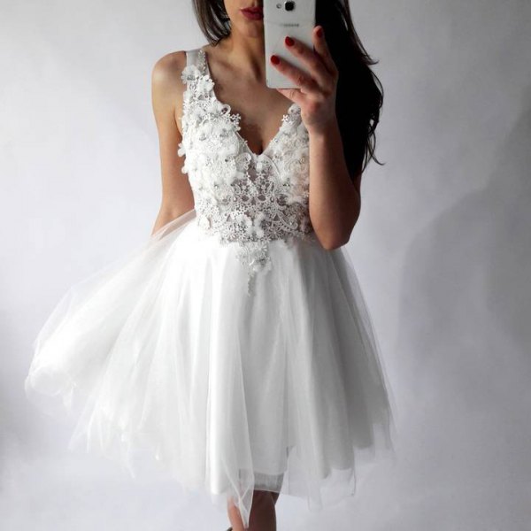 deep lace dress with V-neckline and chiffon tulle
