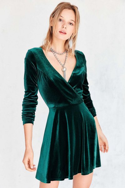 green wrap skater dress with deep V neckline
