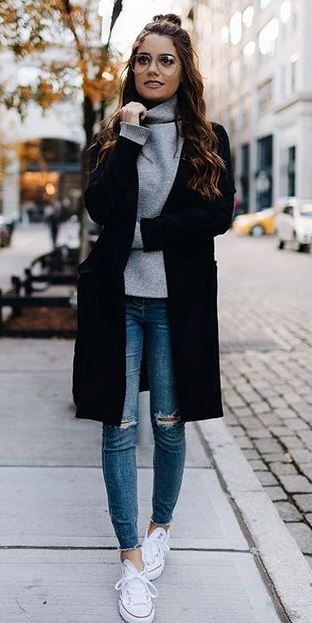 trendy outfit idea: black coat + sweater + grosgrain + sneakers.