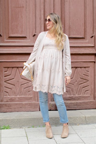 blush pink lace maternity peplum tunic top with light blue jeans