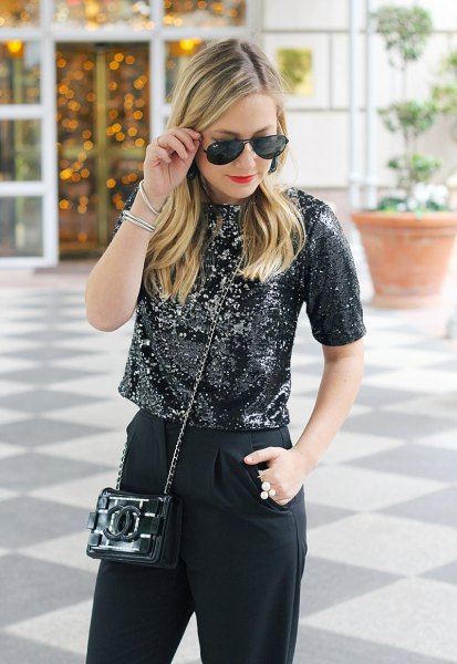 black cropped sequin top with slim-fit jeans