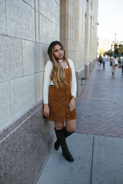 brown corduroy midi dress with white sweater and black overknee boots