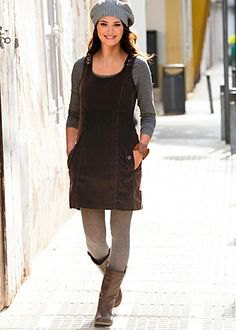 black corduroy mini dress with gray leggings and knee high leather boots