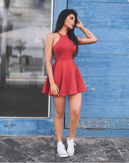 red fit and halterneck flared dress reversed white