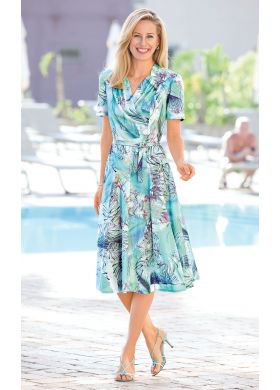 white and turquoise dress with short sleeves and midi belt and floral pattern