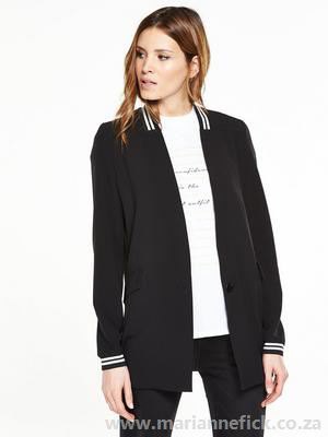 black casual blazer with white relaxed fit t-shirt