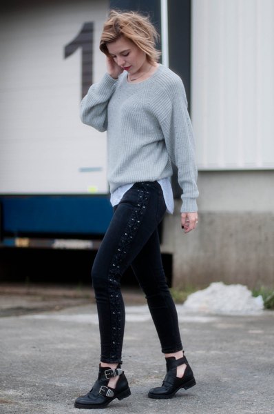 gray ribbed chunky knit sweater with black skinny jeans with laces