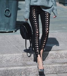 gray knit sweater with black skinny jeans with laces