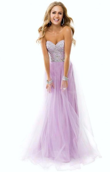 Floor length tulle dress sweetheart fit and flare with a silver sequin cuff bracelet