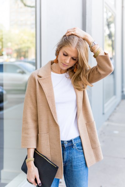 Blush pink wool sweater blazer with white tee and blue slim fit jeans
