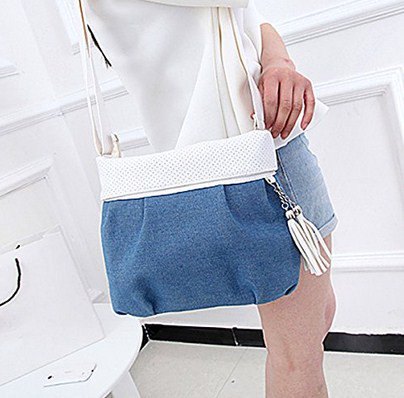 white sweater with mini blue denim shorts and shoulder bag