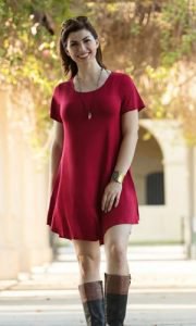 red short-sleeved tunic dress with gray knee-high boots