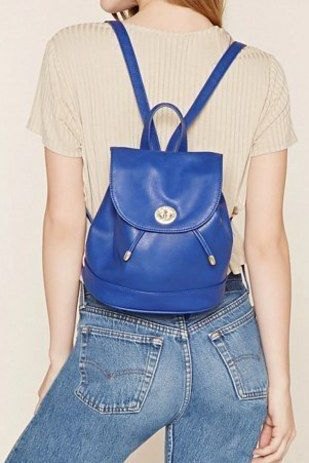royal blue leather backpack with light pink short sleeve top