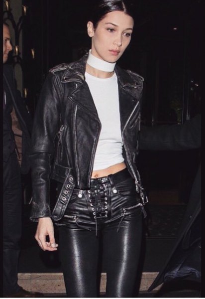 black leather jacket with cropped t-shirt and biker pants