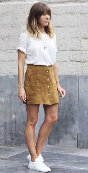 white t-shirt with mini skirt with camel button in front