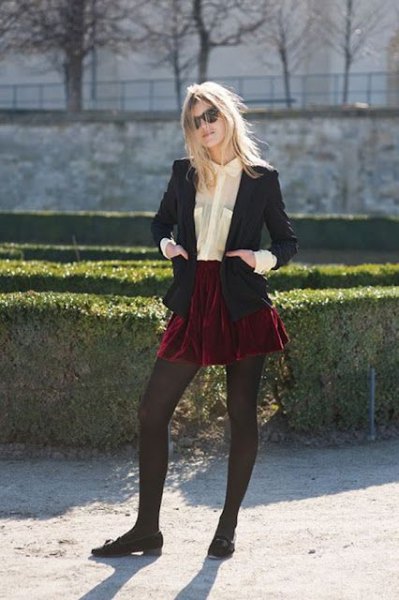 black blazer with burgundy mini skirt and velvet flats