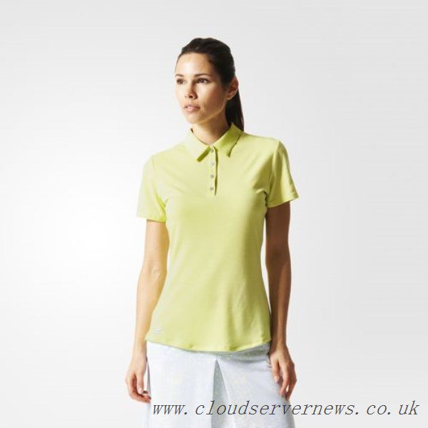 Pale yellow polo shirt with a white knee-length straight skirt