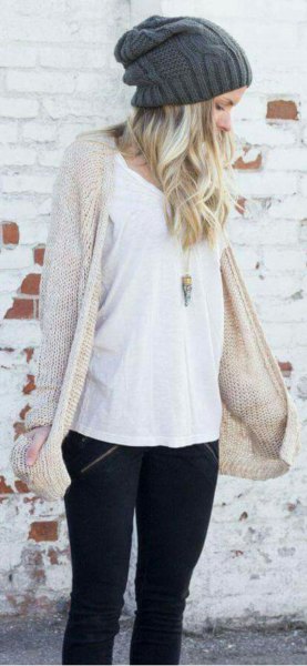 Ivory knit long cardigan with black skinny jeans