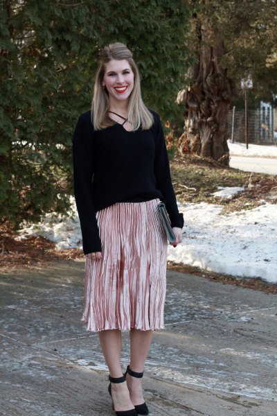 black sweater with rose gold pleated midi skirt
