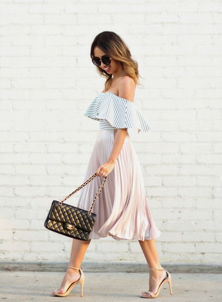 Black and white off the shoulder ruffle top with a pleated midi skirt