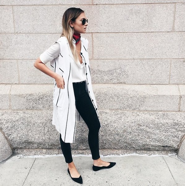 white longline vest with long blouse and black pointed flats