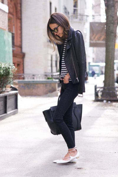 black leather jacket with striped t-shirt and white pointed straps