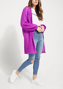long chunky purple cardigan with ripped skinny jeans