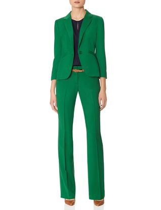 green suit jacket with high-waisted straight-leg pants