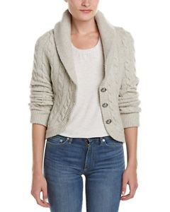 Ivory knit blazer with white scoop top and blue jeans