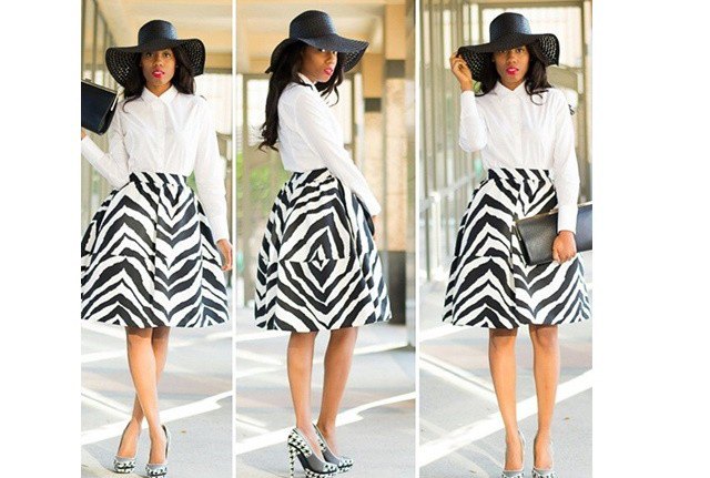 white button down shirt, zebra print flared midi skirt and floppy church hat