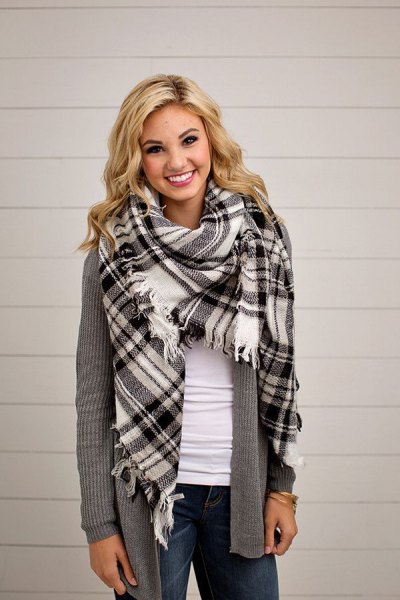 black and white checkered blanket scarf with gray ripped cardigan