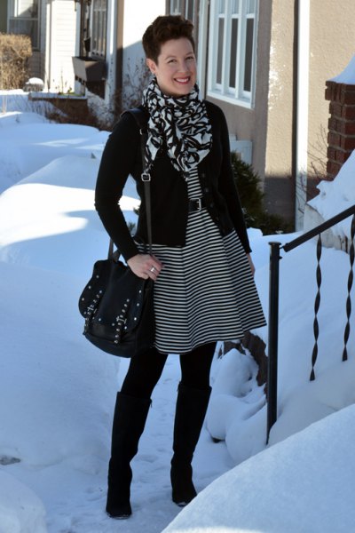 black and gray striped tunic dress with belt and knee high boots