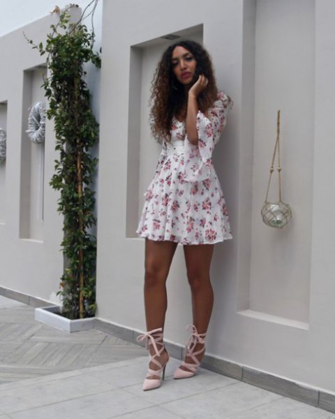 white and blush mini swing dress with half bell sleeves and pink heels