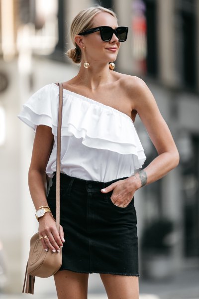 a strapless black mini skirt with a ruffled bodice