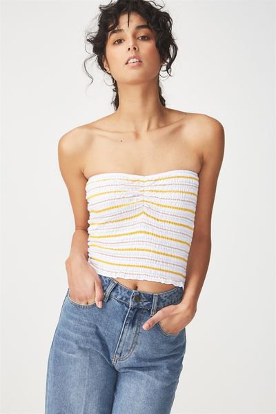 white and orange striped skinny crop top with straight leg blue jeans