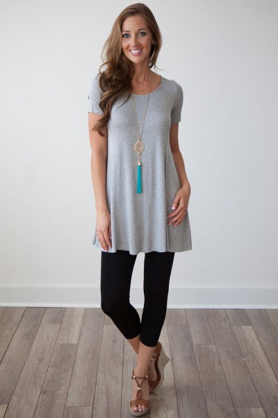 gray short-sleeved peplum tunic top with cropped leggings