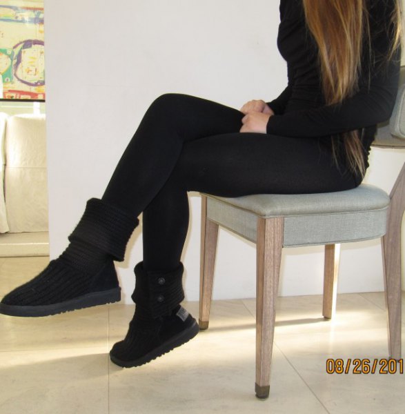 black bodycon sweater with matching mid-calf boots