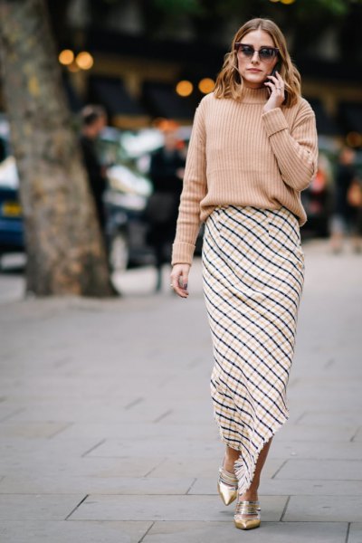 pink ribbed chunky sweater with black and white plaid maxi skirt