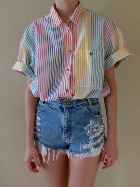 gray and white striped button down shirt and ripped denim shorts